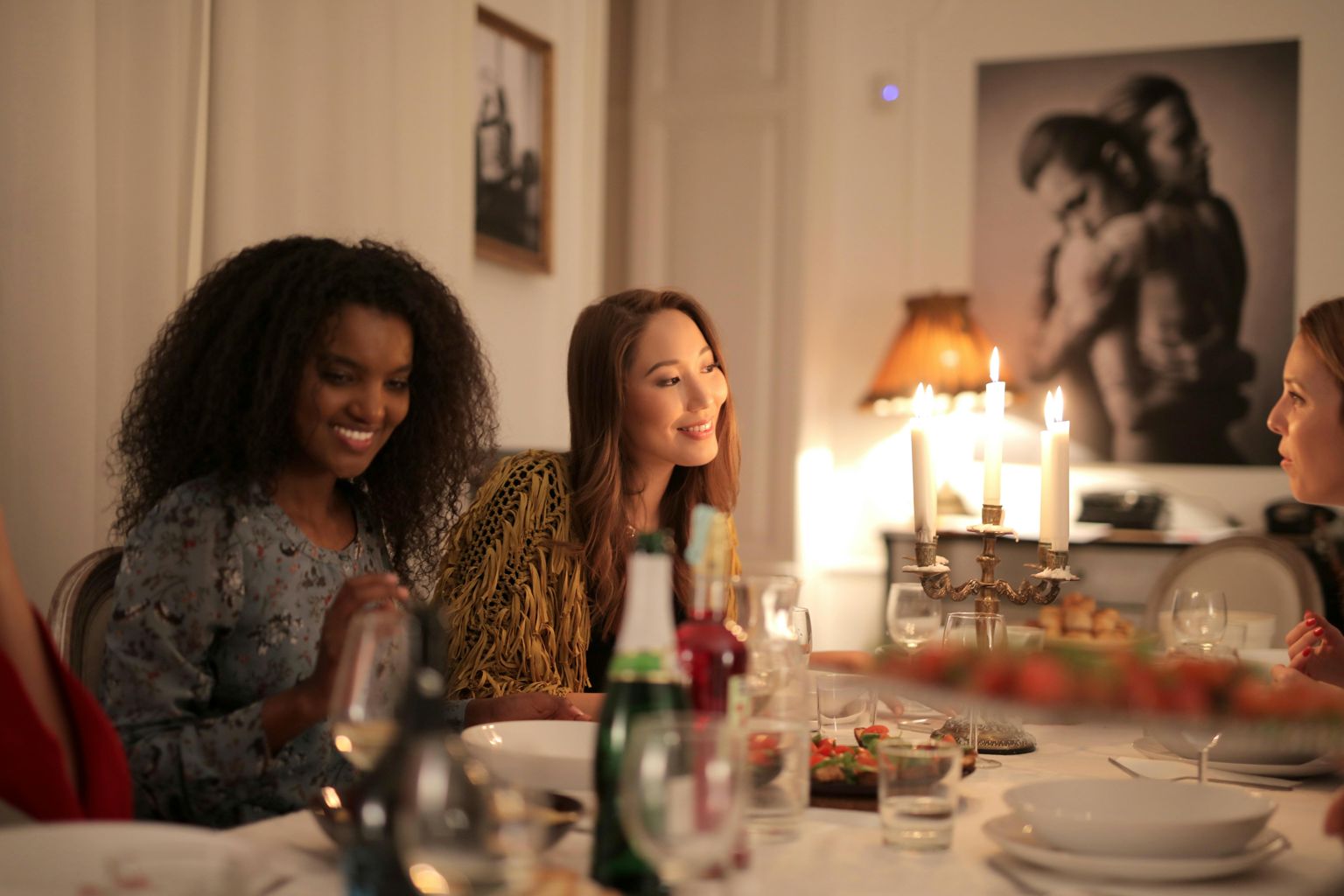 A &ldquo;hyggelig&rdquo; dinner party at home with friends instead of going out is a great way to save money.